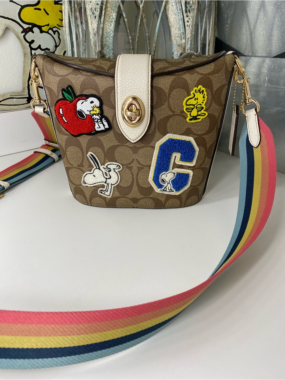 Coach x Peanuts Snoopy Signature Canvas Patch Bucket Bag with Multi-Color Strap